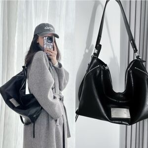 Black Leather Shoulder Bag with Polished Plate